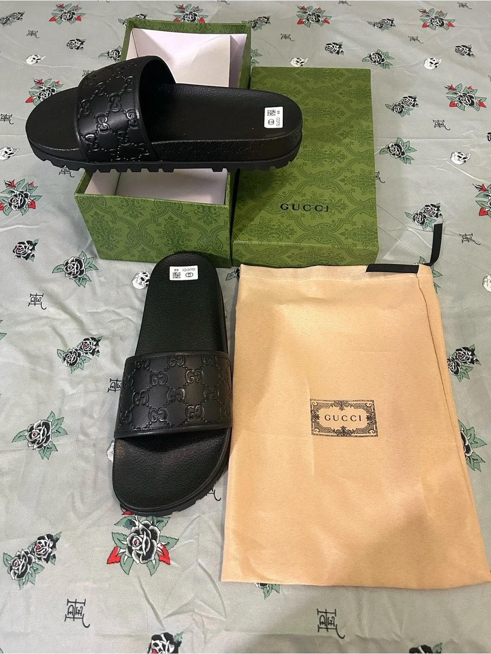Gucci Black Embossed Logo Slide Sandals